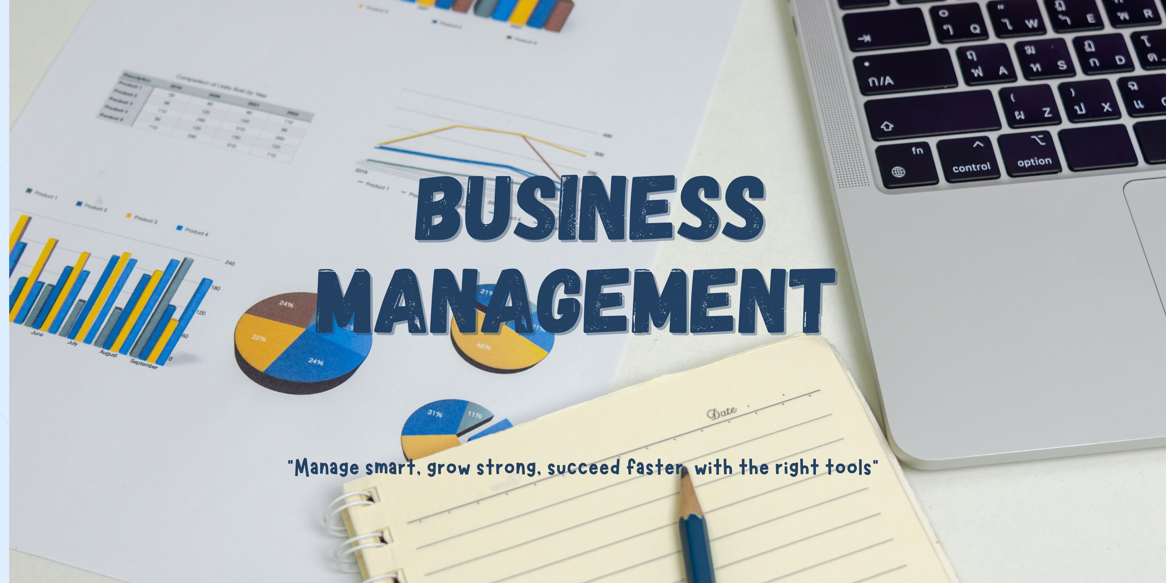 laptop and business charts on the table